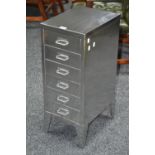 A vintage STOR polished filing cabinet