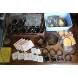 Horology - a large quantity of mainspring steel banding of various gauges and widths; brass wire.