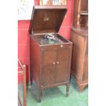 A His Masters Voice gramophone in oak case