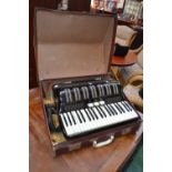 A Concordia double forte piano accordion, black case,