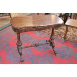 A rosewood card table, serpentine fold over top enclosing red baize playing surface,