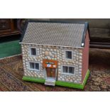 A Dolls house and dolls house furniture