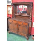 An oak mirror-back sideboard