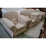 A Parker Knoll four piece suite comprising three seat settee,