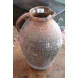 A 15th century style terracotta salt glazed pitcher, single handle,