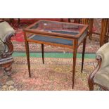 An Edwardian satinwood and mahogany rectangular bijouterie table, hinged rectangular top,