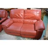 An electric reclining two seat sofa