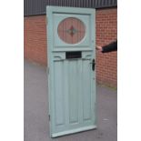 Architectural Salvage - a 1940's front door, with oval leaded light, 195cm tall, 83cm wide approx.