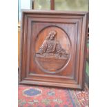 After Da Vinci, a carved mahogany panel, The Lords Supper,