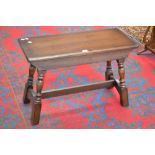 An oak side table with lift top,