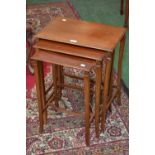 An Edwardian mahogany nest of three tables