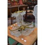 A French glass droplet and gilt chandelier ceiling light