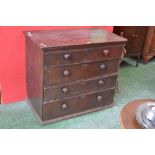 A George III oak chest of drawers, two short over three long, turned handles.