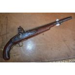 A flintlock pistol, 35.