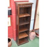 An oak five tier bookcase