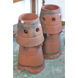 A pair of cone shaped chimney pots