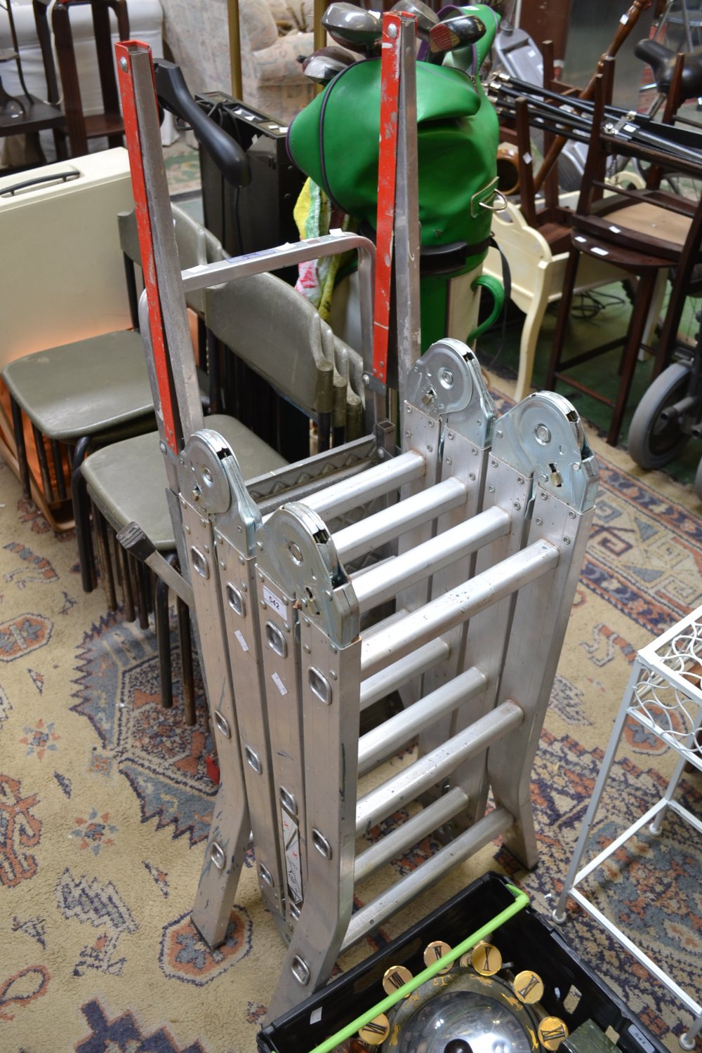 An ABRU multi position aluminium ladder;