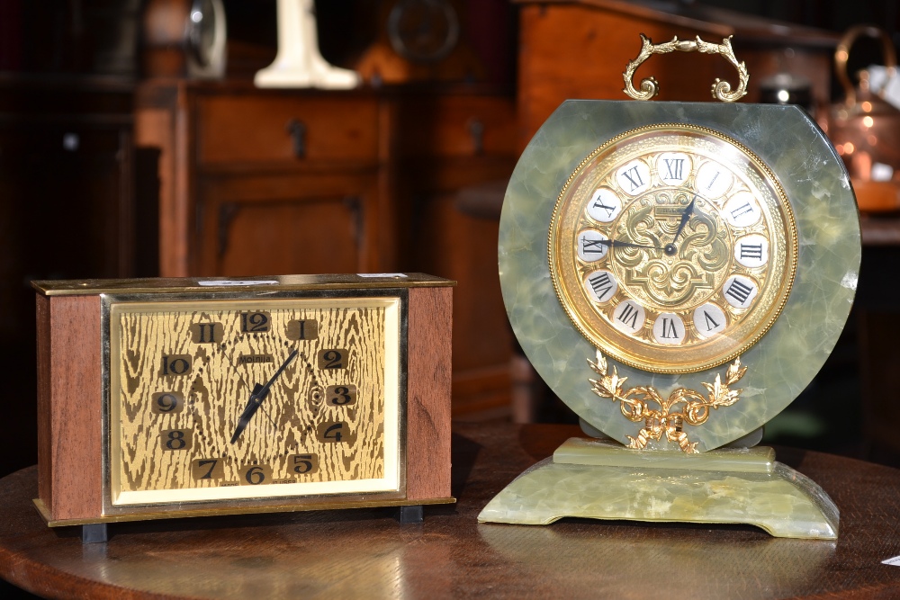 An Elsinor onyx and gilt metal mounted mantel clock;