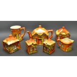 A cottage ware tea set comprising, teapot, mug, milk jug, sugar bowl,
