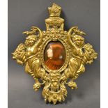 An embossed brass miniature picture frame