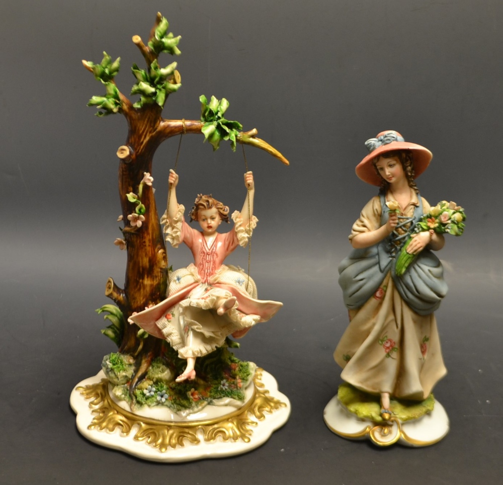 A Capodimonte porcelain figure, Girl in a Swing, signed, 36/++2, printed impressed mark; another,