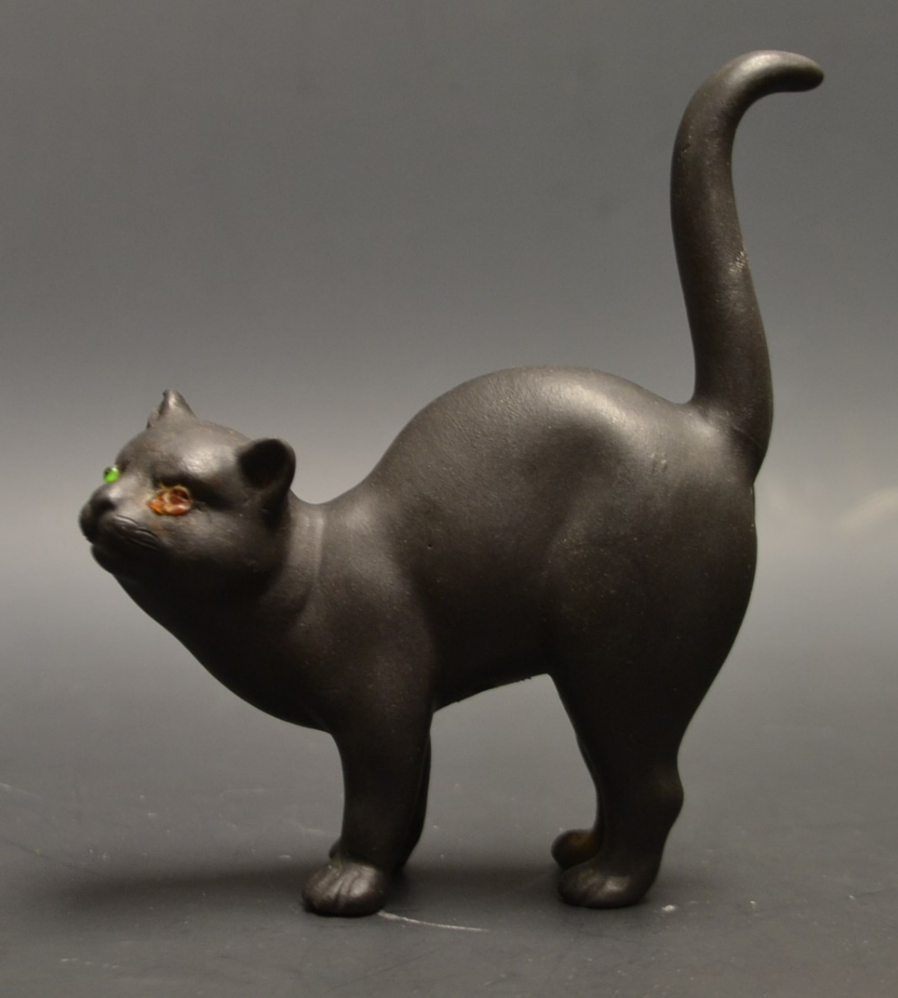 A Wedgwood black Basalt cat with glass eye
