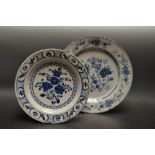 A large blue and white Delft plate; another,