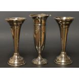 Silver - a pair of trumpet form posy vases, weighted bases,