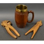 Treen - two pairs of nutcrackers and a mug (3)