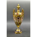 A Royal Crown Derby 1128 pattern gold band two handled urn