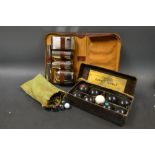 A gentleman's chrome travelling wash  and brush set;  marbles,