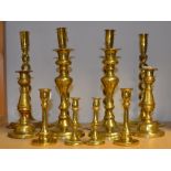 Brassware - A pair of Victorian inverted baluster brass candlesticks, ejector rod,