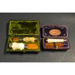 Meerschaum cased cigar and cheroot holders,