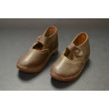 A pair of Victorian childs Clogs, brown leather top, wooden soles,