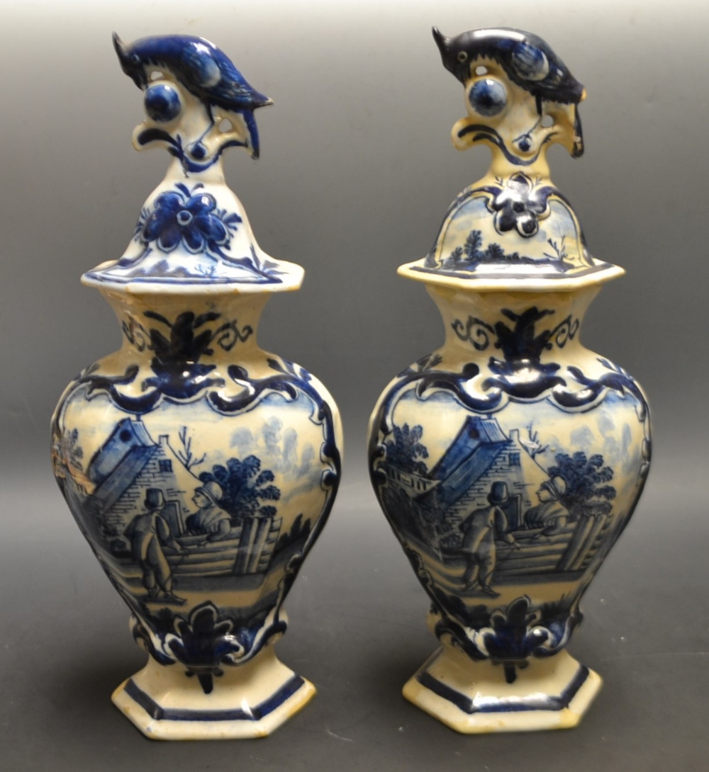 A pair of lidded blue and white vases (2)