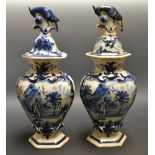 A pair of lidded blue and white vases (2)