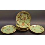 A set of four Chinese plates, painted in polychrome with exotic birds,