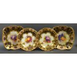 A pair of Royal Worcester scalloped edged dishes;