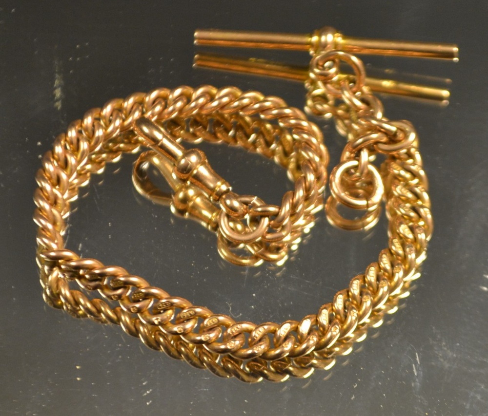 A 9ct yellow gold albert chain and T bar, 21cm long, 23.