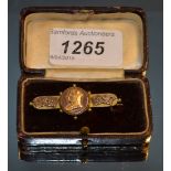 A gold fronted Victorian jubilee brooch,