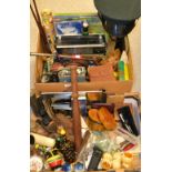 Boxes and objects- golf clubs, child's sewing machine, soviet radio, truncheon, clock, hydrometer,