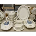 A Royal Doulton Pastoral pattern six setting dinner service including two tureens, dinner, side ,