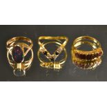 An 18ct gold five stone ruby ring; an 18ct gold diamond and gold opal cabochon ring, 9.