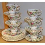 A Paragon bone china 'Garden Flowers' tea service for six, comprising teacups,