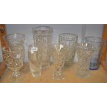 Glassware - a Lenox swirl glass ovoid vase, a large cut glass vase, another smaller,