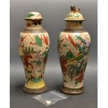 A pair of Chinese lidded vases (2)