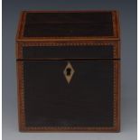 A small George III rosewood rectangular tea caddy, hinged cover enclosing a falling doubter,