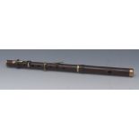 A 19th century rosewood flute, by Henry Potter, 30 Charring Cross, London, stamped, 39cm long, c.