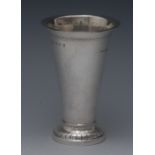 A German silver trumpet shaped beaker, everted rim, domed foot engraved with stylised leaves,