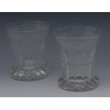 A pair of late 19th century clear glass waisted cylindrical The Last Drop tumblers,